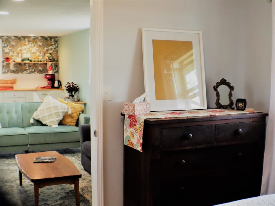 The view from the bedroom to the living area an kitchenette.