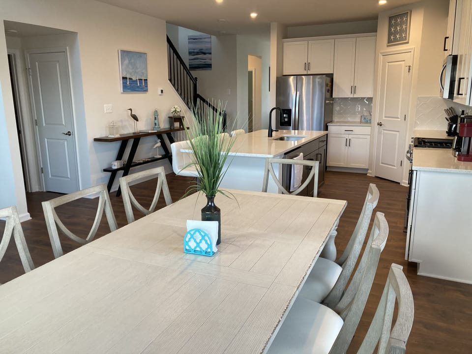 Dining table for 8 looking into kitchen