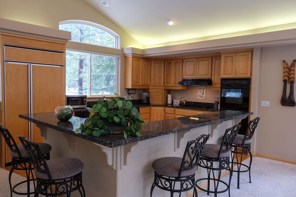 Full service kitchen stocked with essentials to make your stay comfortable.