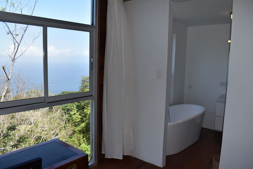 large soaking tub overlooks the ocean