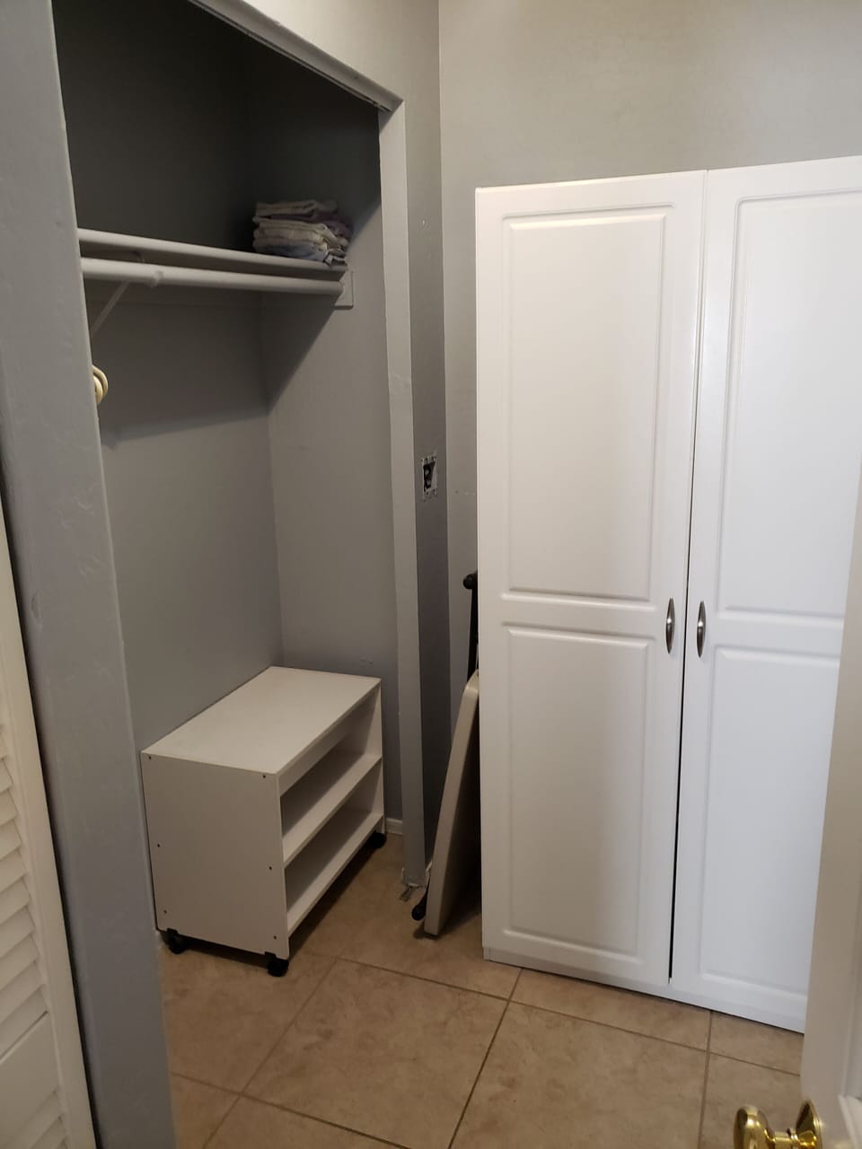 Large walk in closet for suitcases, hanging, dressing.