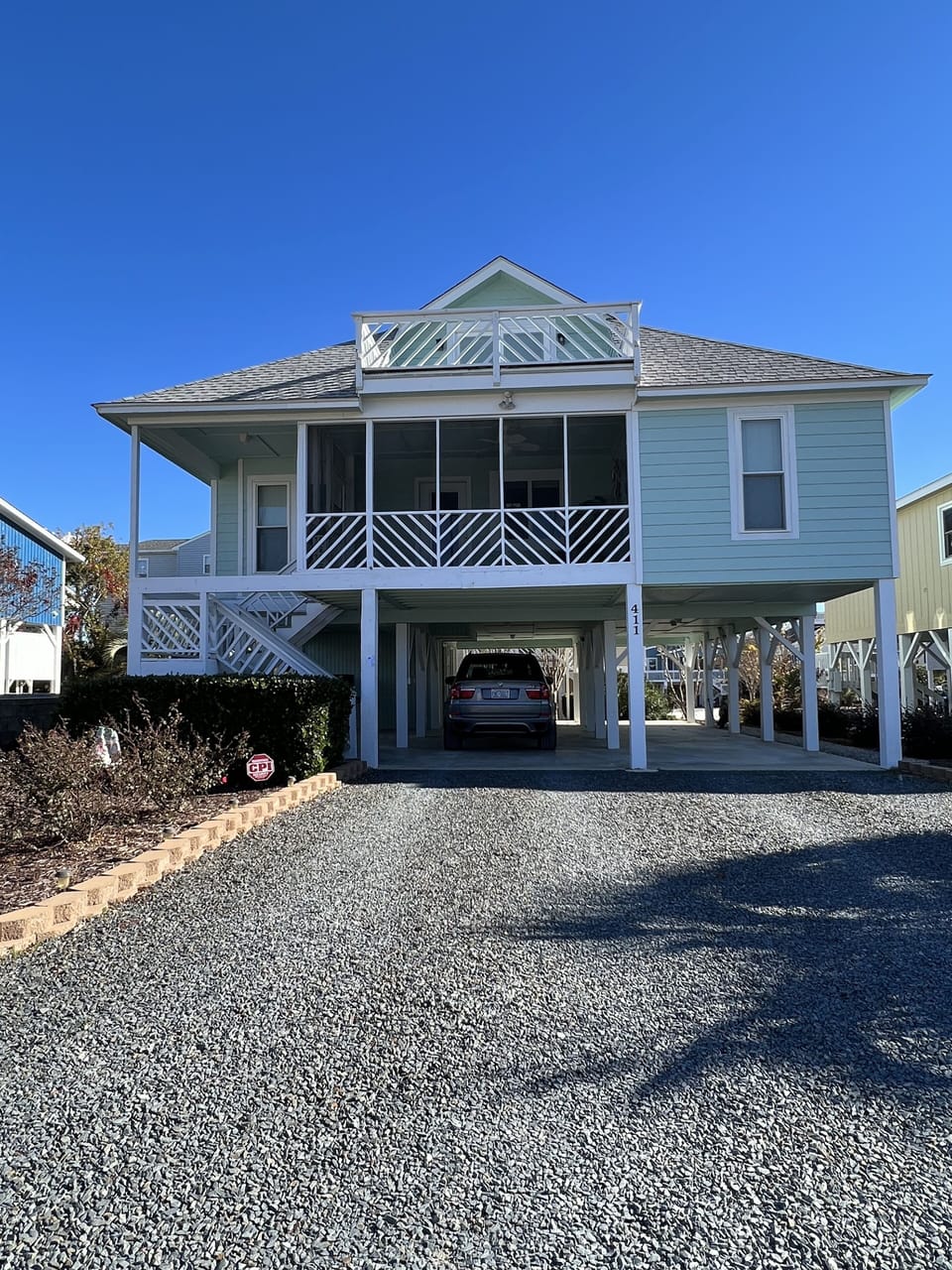Parking for 4 vehicles (2 under Patio and 2 on rocks)