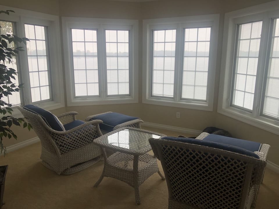 Master bedroom personal turret seating area. Panoramic views of the lake.