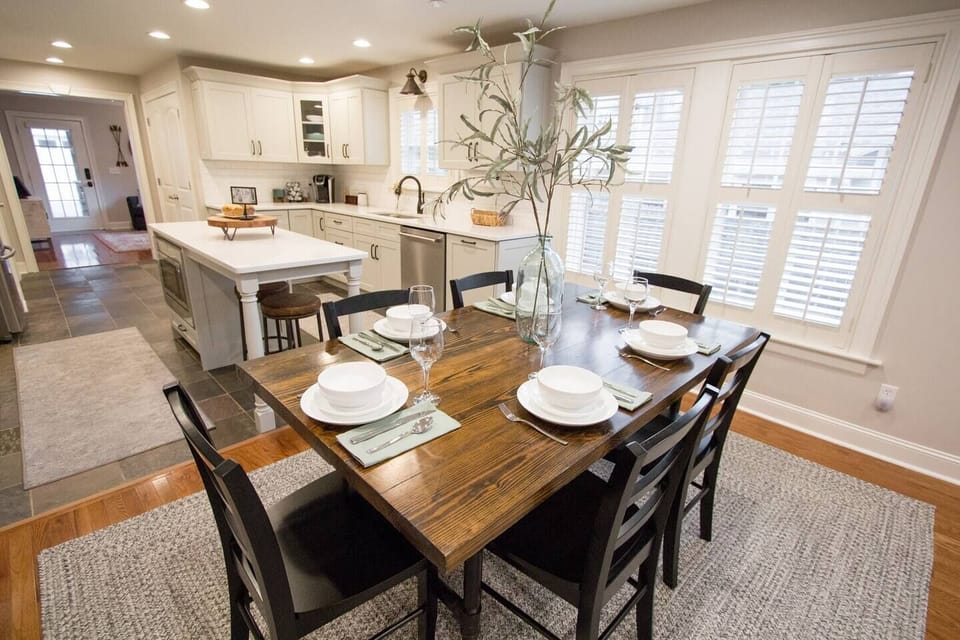The dining table was locally crafted with salvaged wood from a 100-year-old barn!