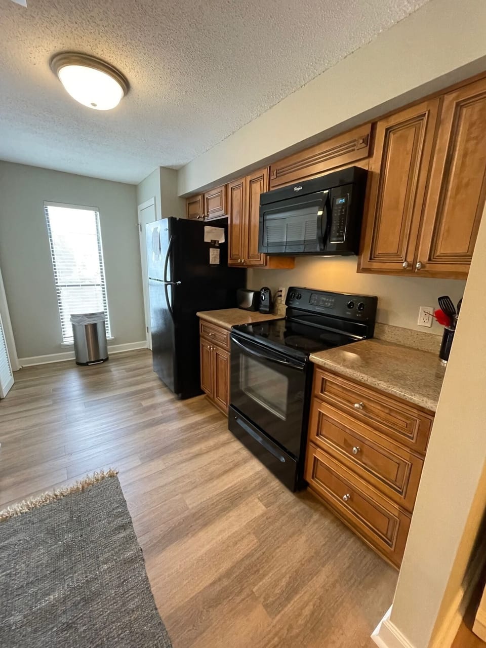 Full size fridge, microwave and stove/oven.