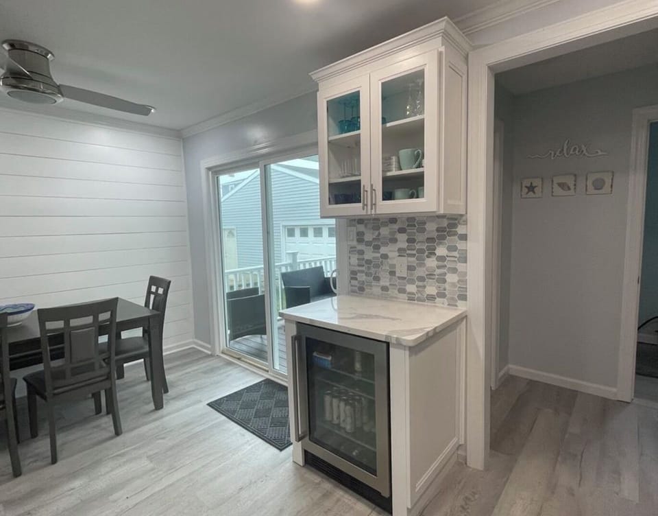 Coffee/Wine Bar with a beverage fridge. 