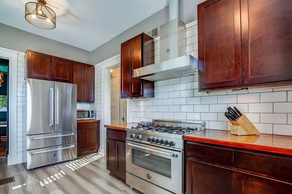 Second floor fully stocked gourmet kitchen with gas oven. 