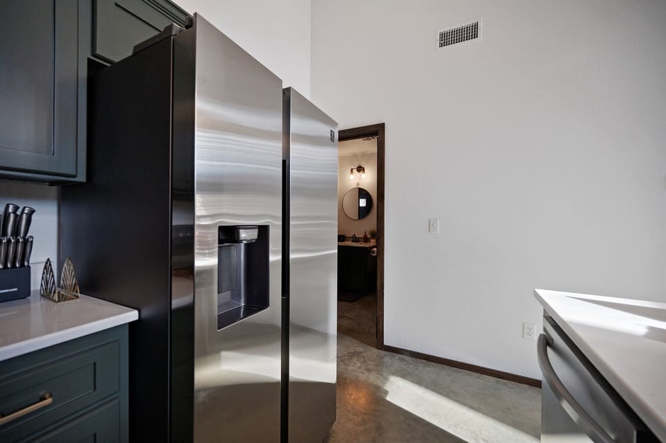 Kitchen: Modern appliances and sleek design await culinary adventures in this stylish space!