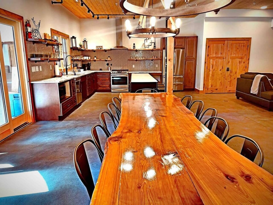 Beautiful kitchen that has everything you need to cook a fabulous dinner. Even hand crafted table that seats 12 with addition 5 seats at the island. 