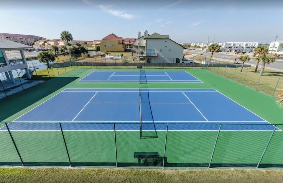 Enjoy a game of tennis at Regency Towers