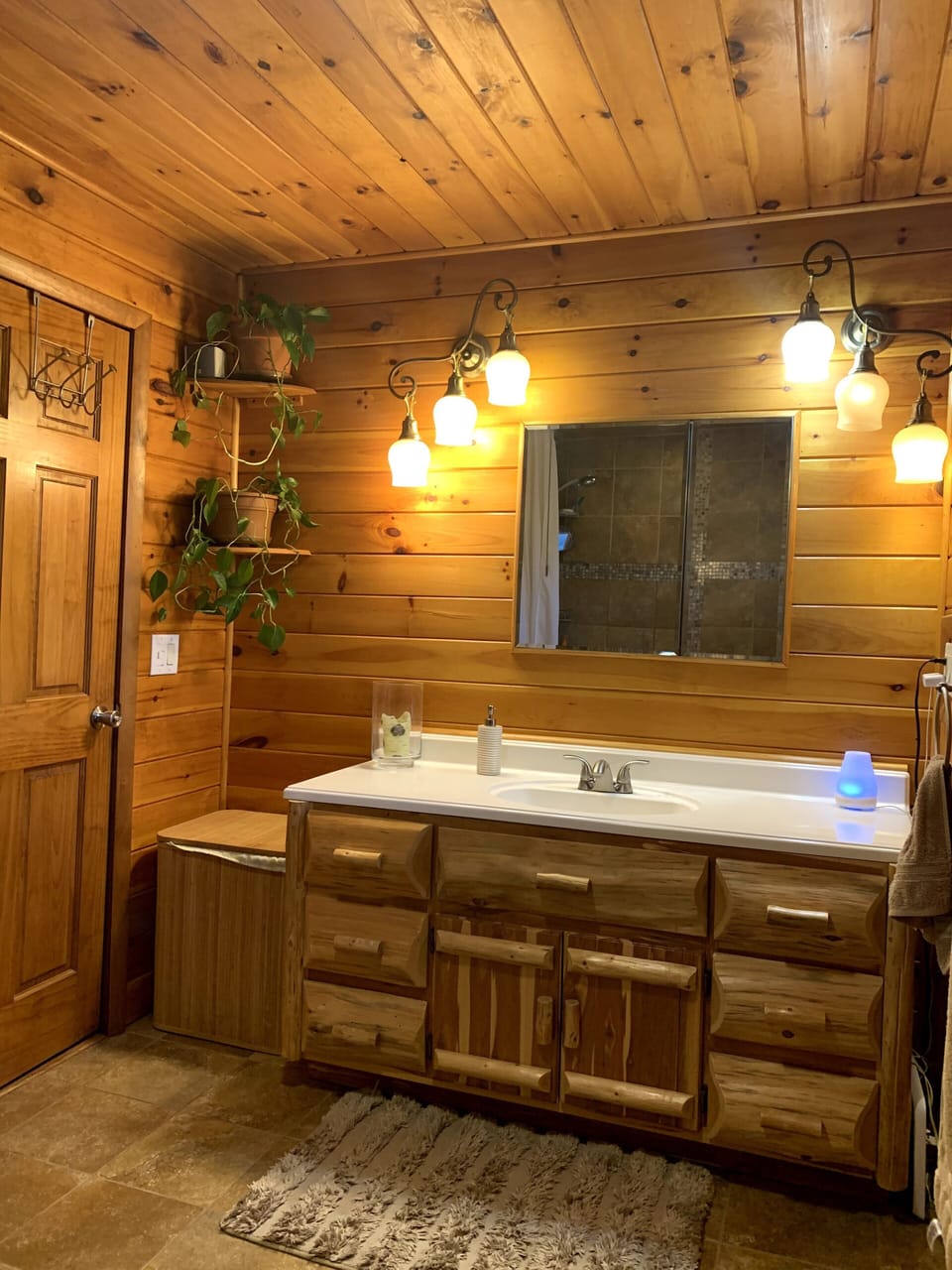 Full bathroom  on the first floor with Adirondack style vanity