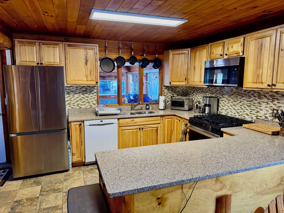 There is plenty of counter space for a family meal preparation.