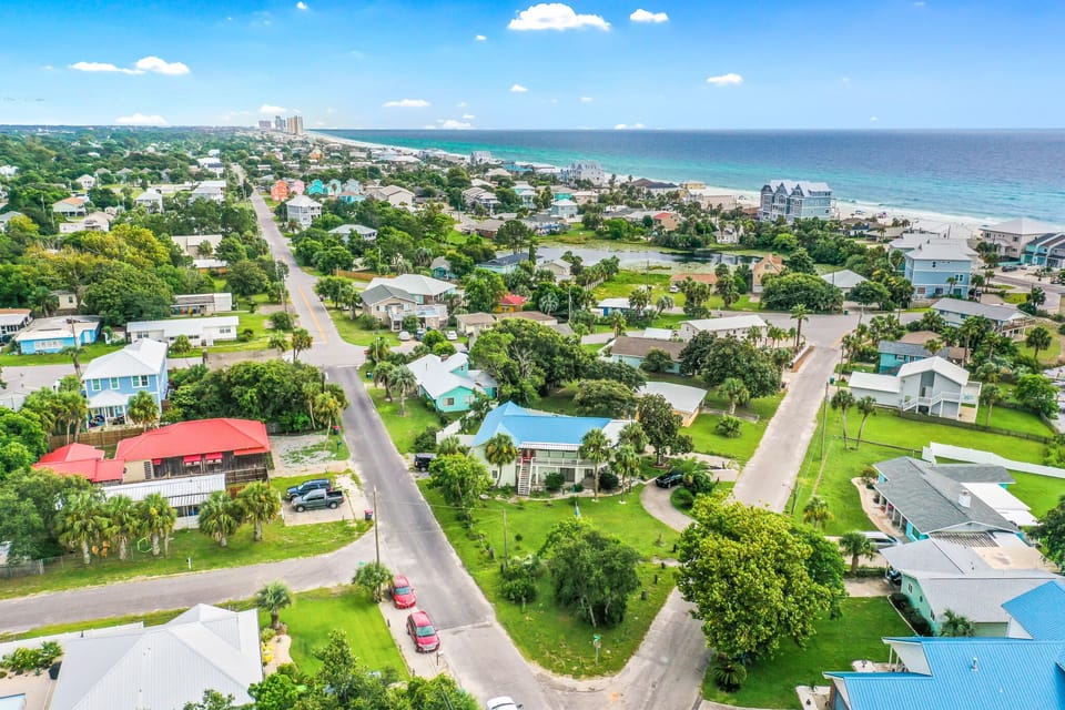 Mine is the red roof.  A quick walk to the main road, follow to Beach Access 84.