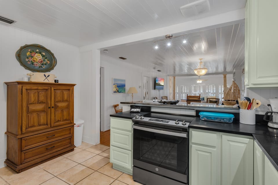 Armoire serves as alternate Pantry.  Lower drawers have tools, please watch kids