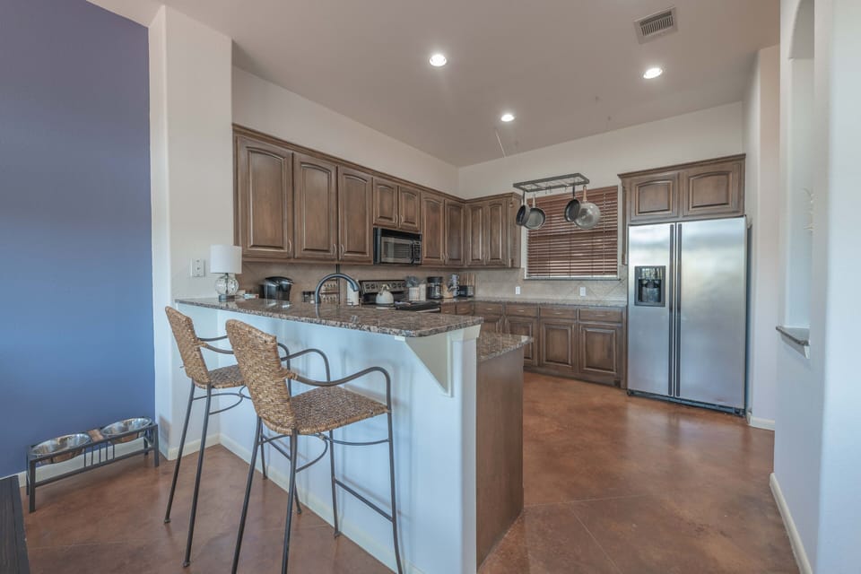Bar seating into kitchen