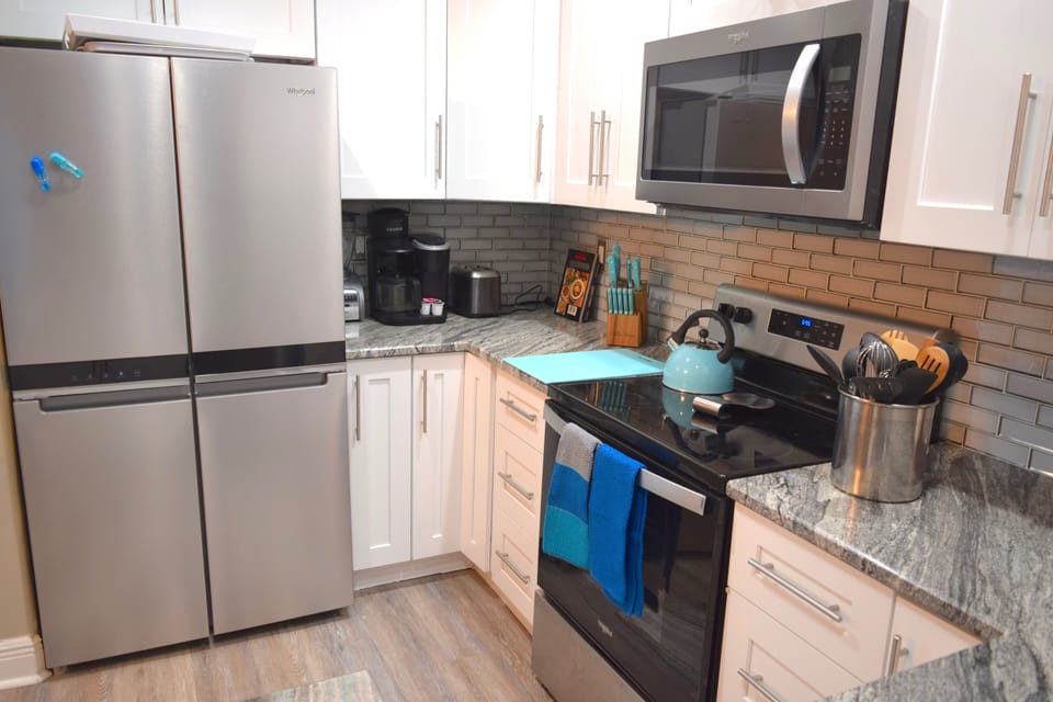 Modern updated kitchen to help you entertain and nourish. Kcup coffeemaker.