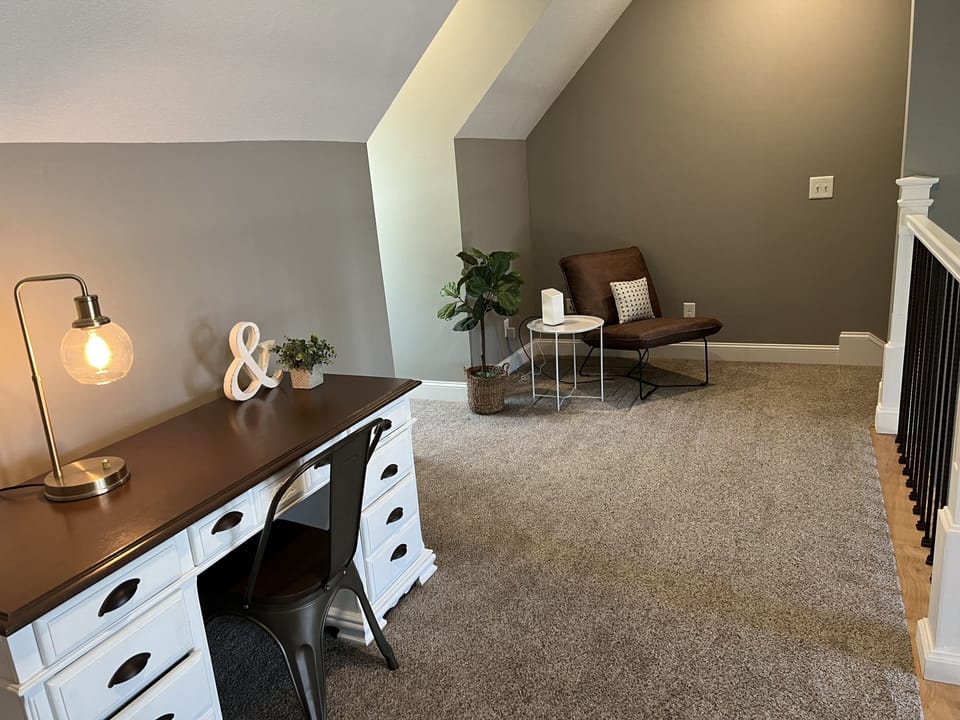 If you MUST do work, there is an office in the loft above the living area.