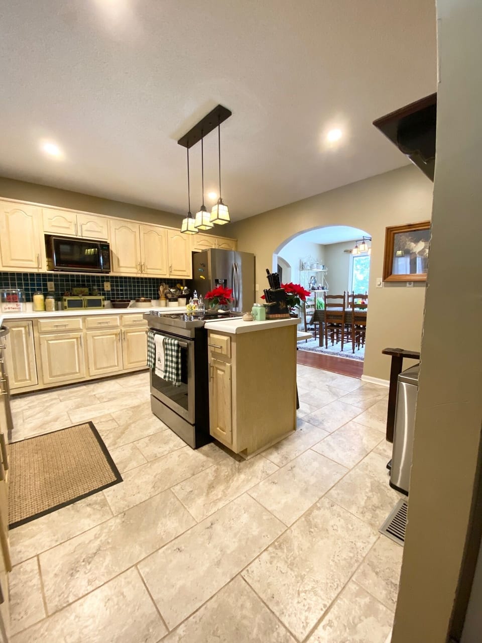 Fully equipped kitchen view from back door and garage door