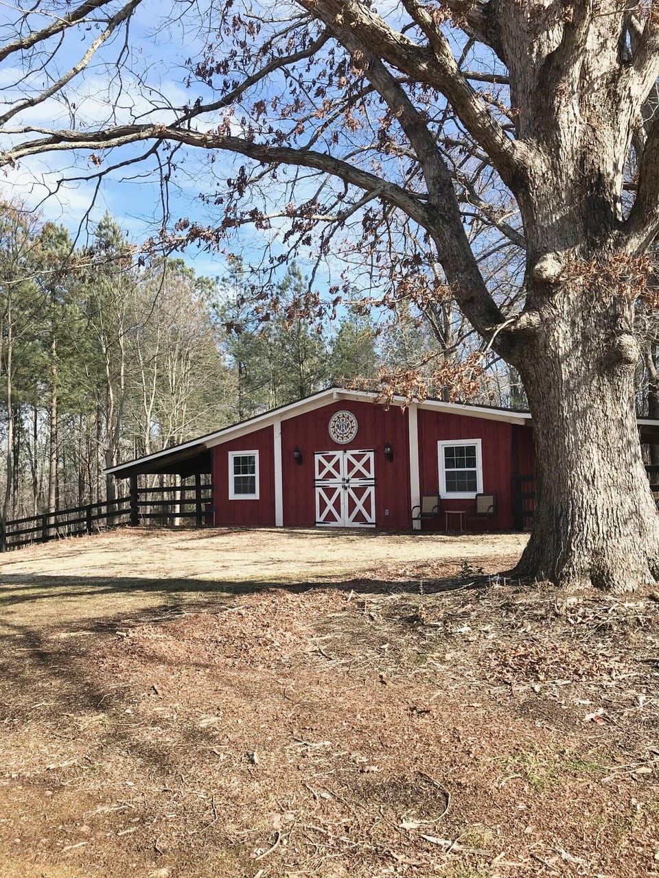 Barn complete w/ HVAC, water & electricity surrounded by 2 fenced acres
