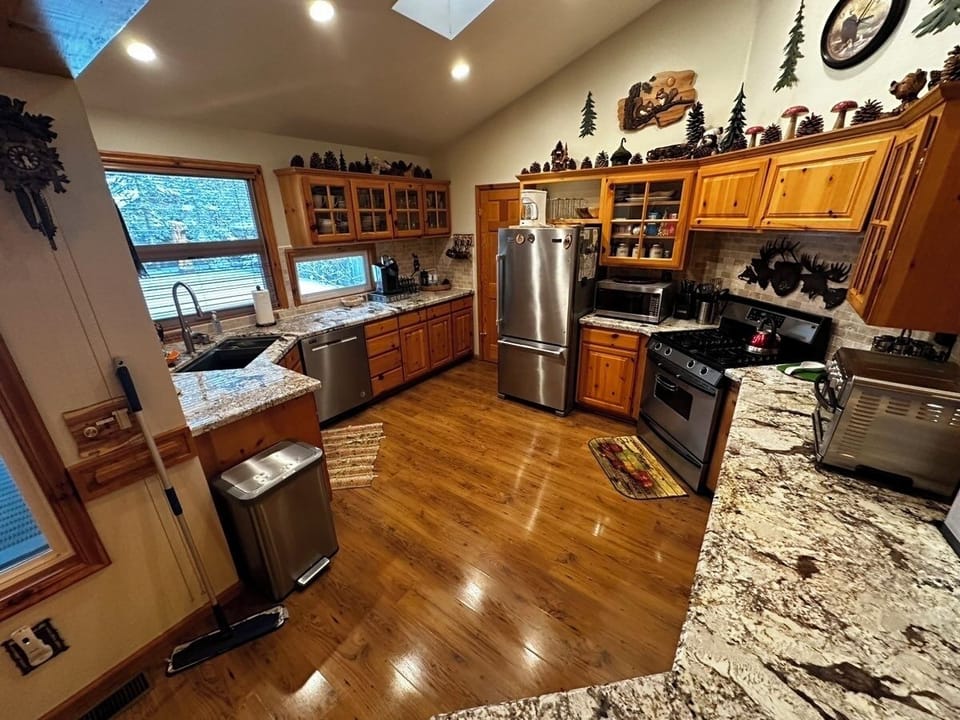 Kitchen with stainless steel appliances and granite countertops