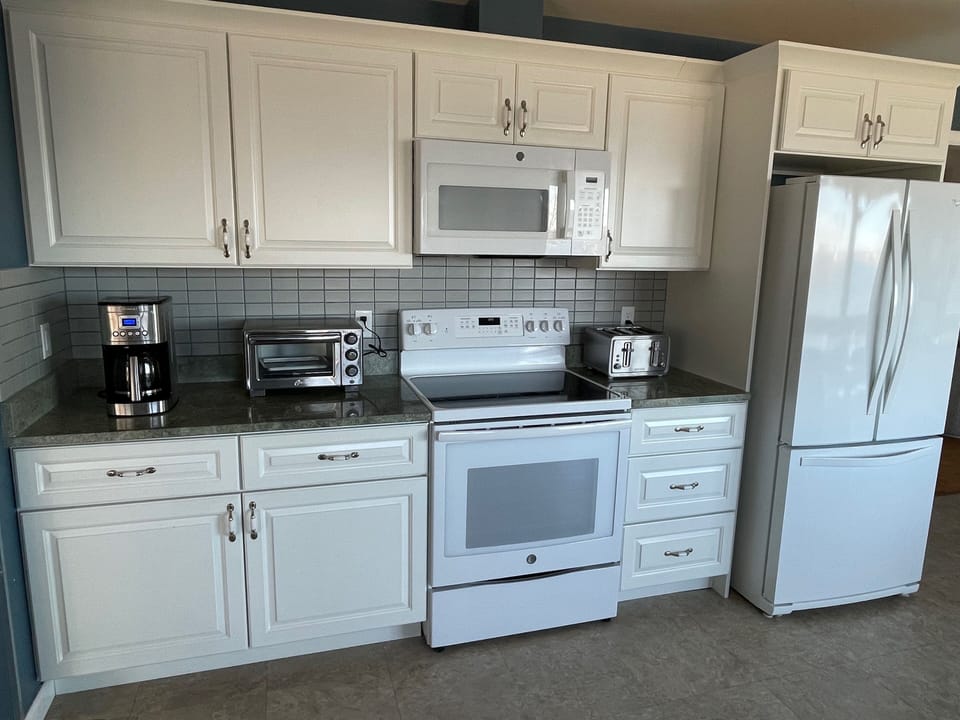 Coffee, Toaster Oven, Microwave, Toaster, Electric Stove/Oven, & Refrigerator