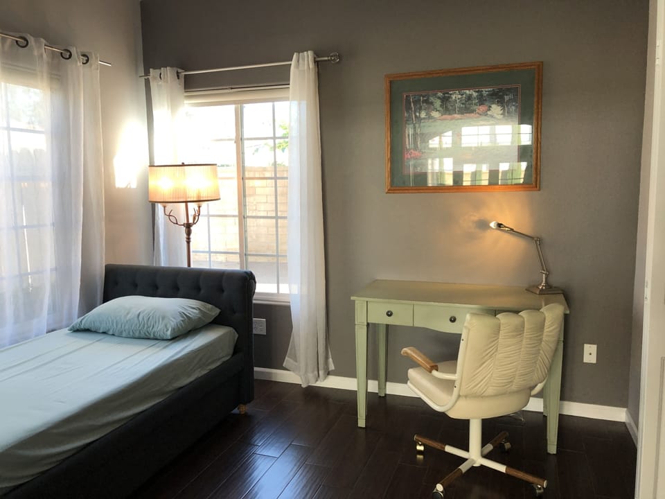 2nd bedroom with a double-twin trundle, an office desk and chair.