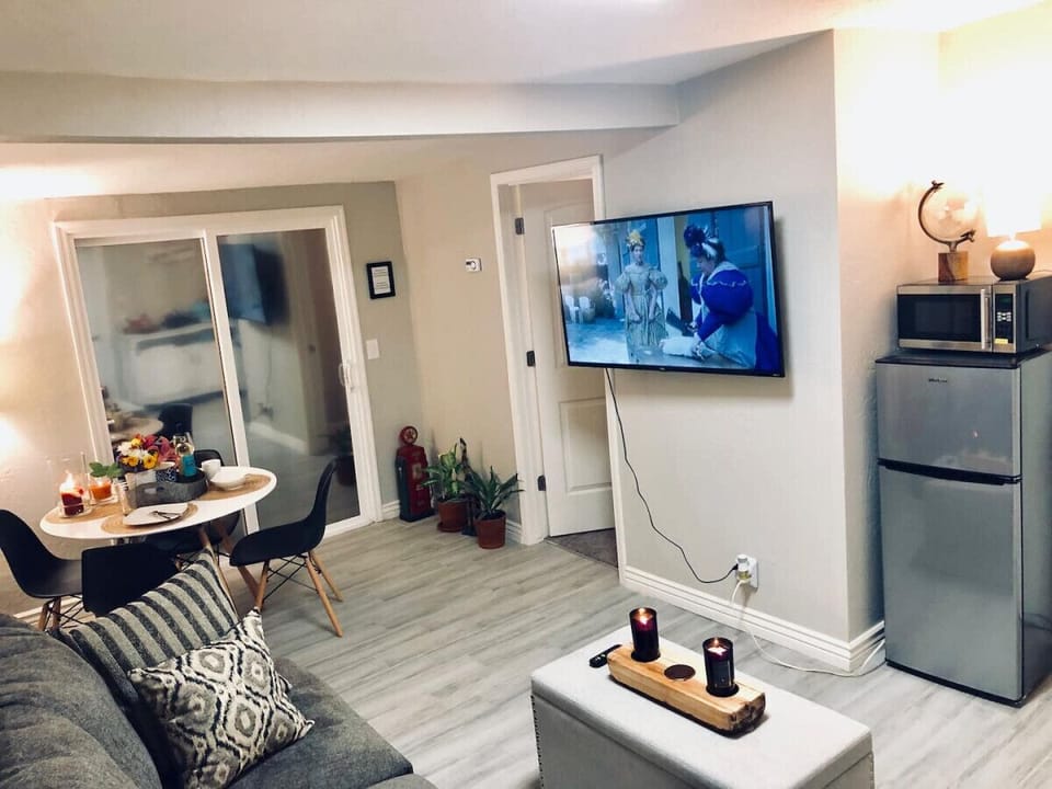 Living/Dining area with mini-fridge and microwave.