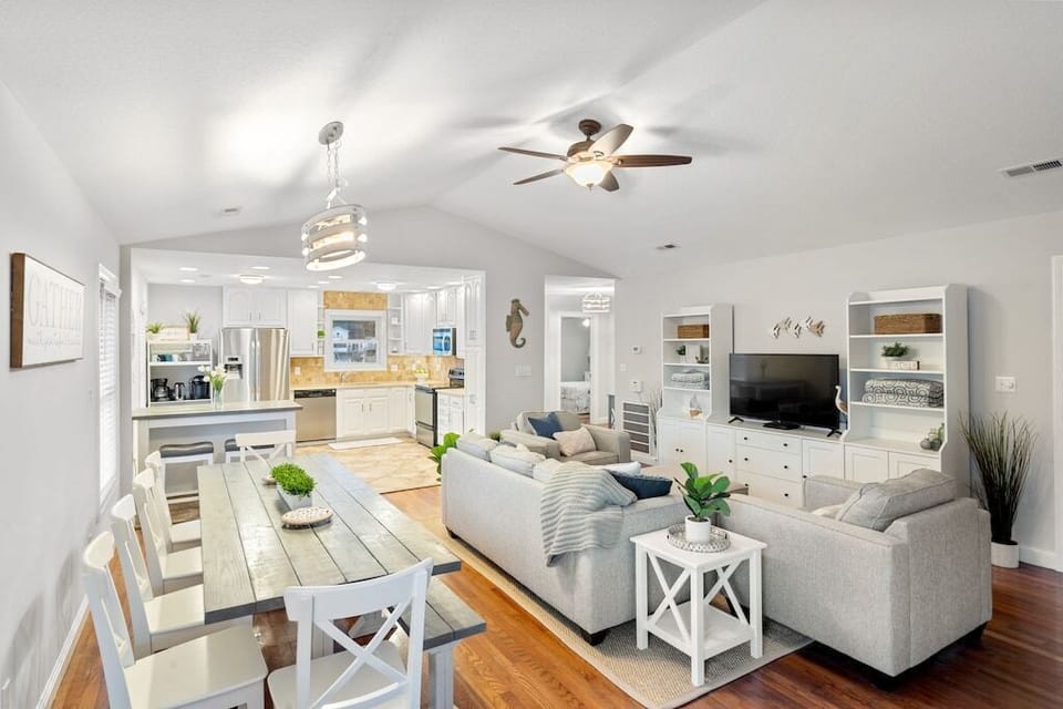 Open concept living room, dining area, and kitchen