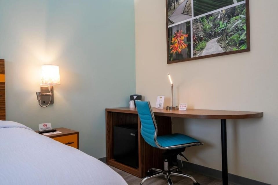 Plan your day with a dedicated workspace and in-room coffee.