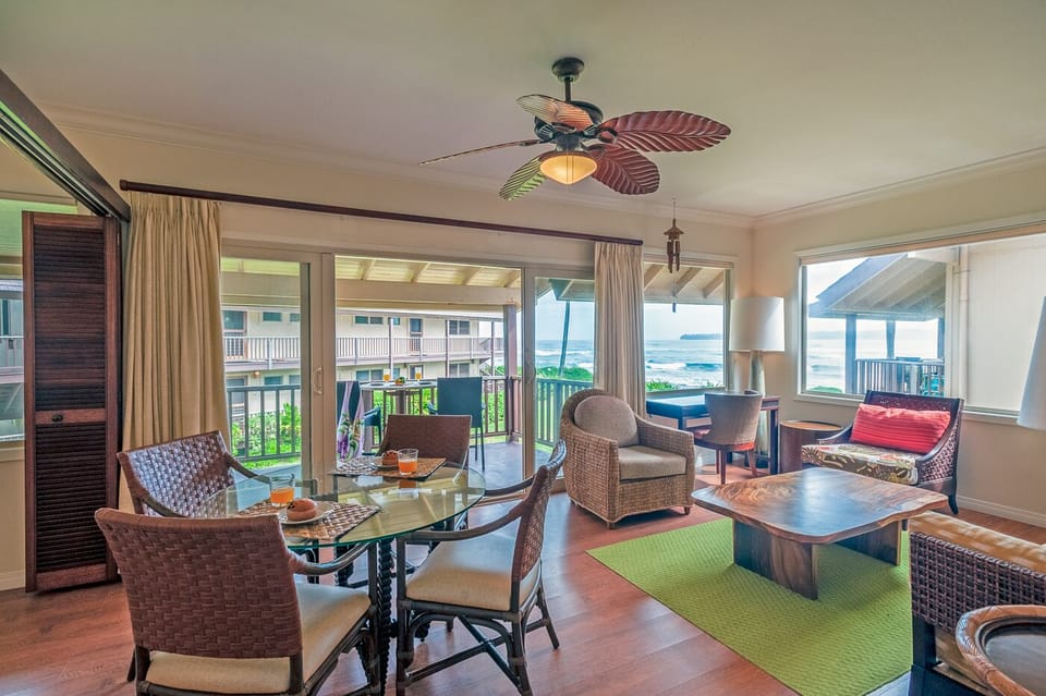 Hanalei Colony Resort K4 oceanfront living room - As you can see, there are plenty of oversized windows that look out onto the water! You're guaranteed a gorgeous view from any seat in the house!
