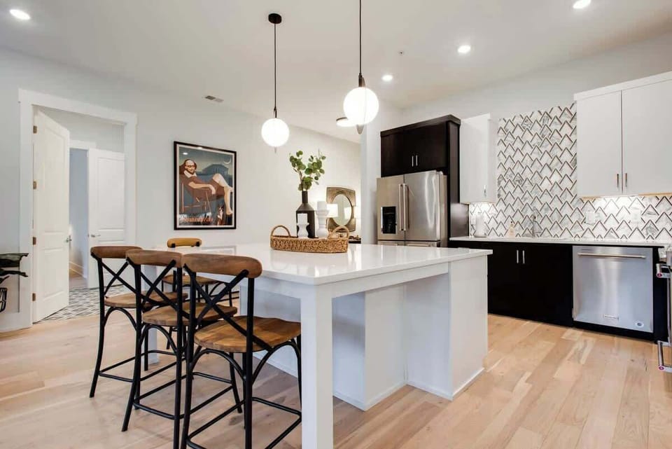 Pull up a seat at the kitchen bar—perfect for casual bites, morning coffee, or keeping the chef company.