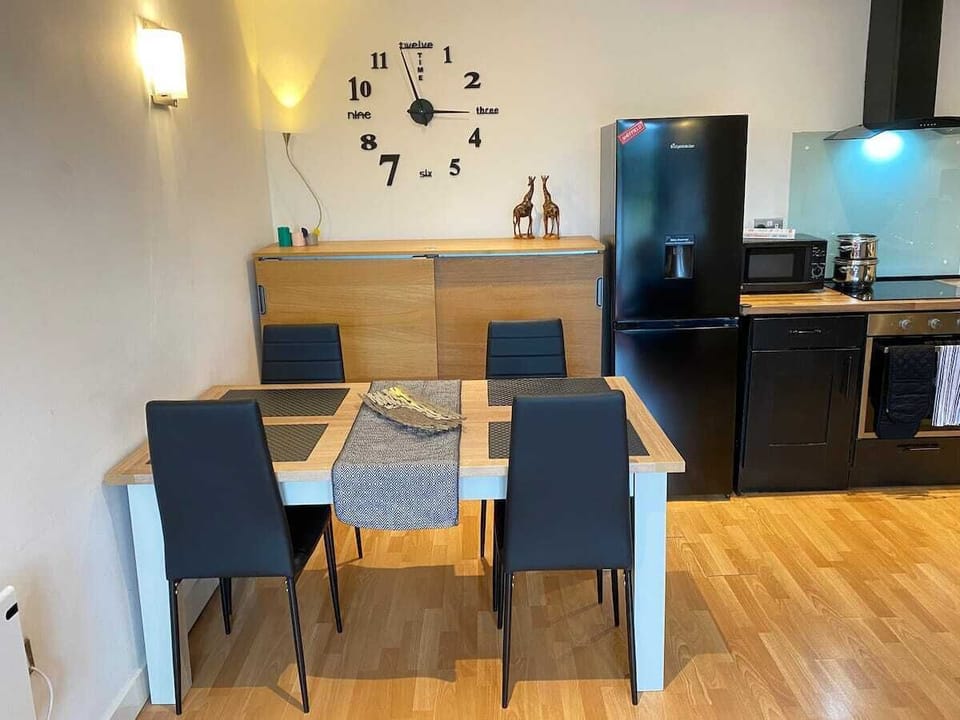 Living room, dining and kitchen space.