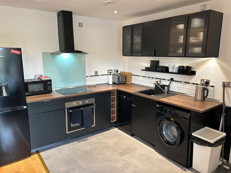 Living room, dining and kitchen space.