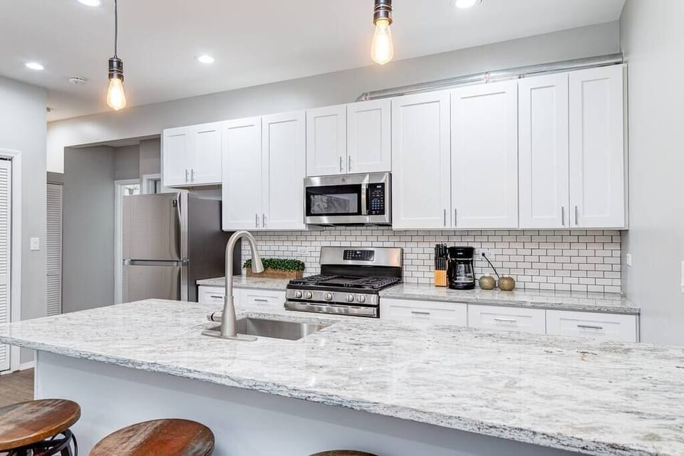 Living Room / Fully stocked kitchen