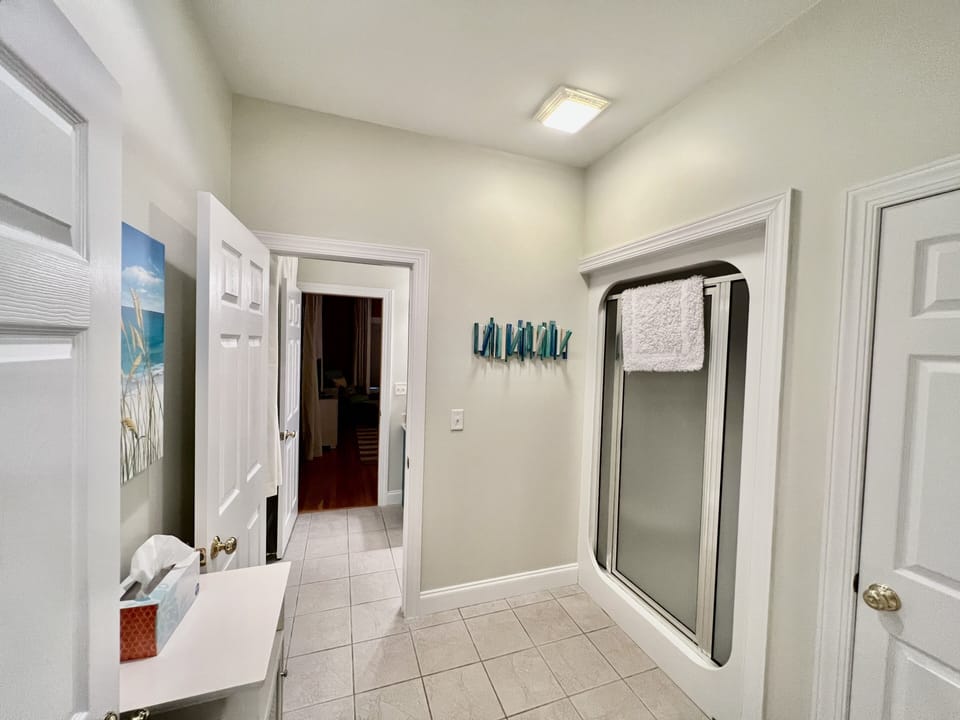 Private shower area shared by Bedrooms 3 and 4