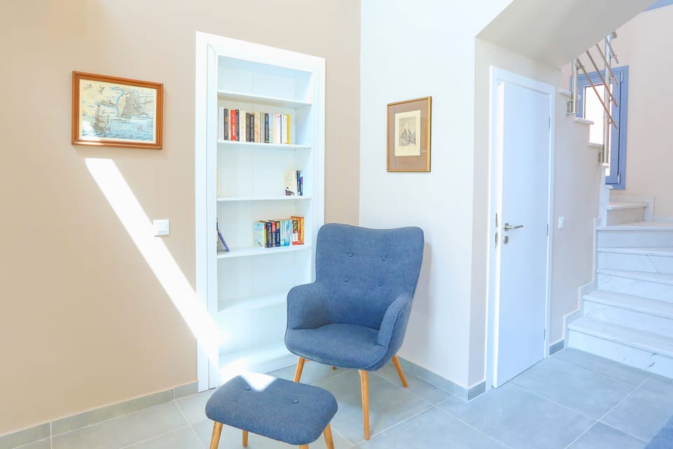 A marble staircase leads to the attic bedroom