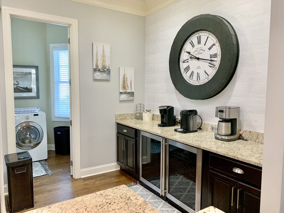 Nespresso, Standard drip pot, and Keurig provided; beverage refrigerator