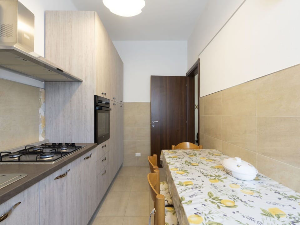 Cabinetry, Building, Sink, Countertop, Wood, Interior Design, Kitchen Stove, Floor, Flooring, Door