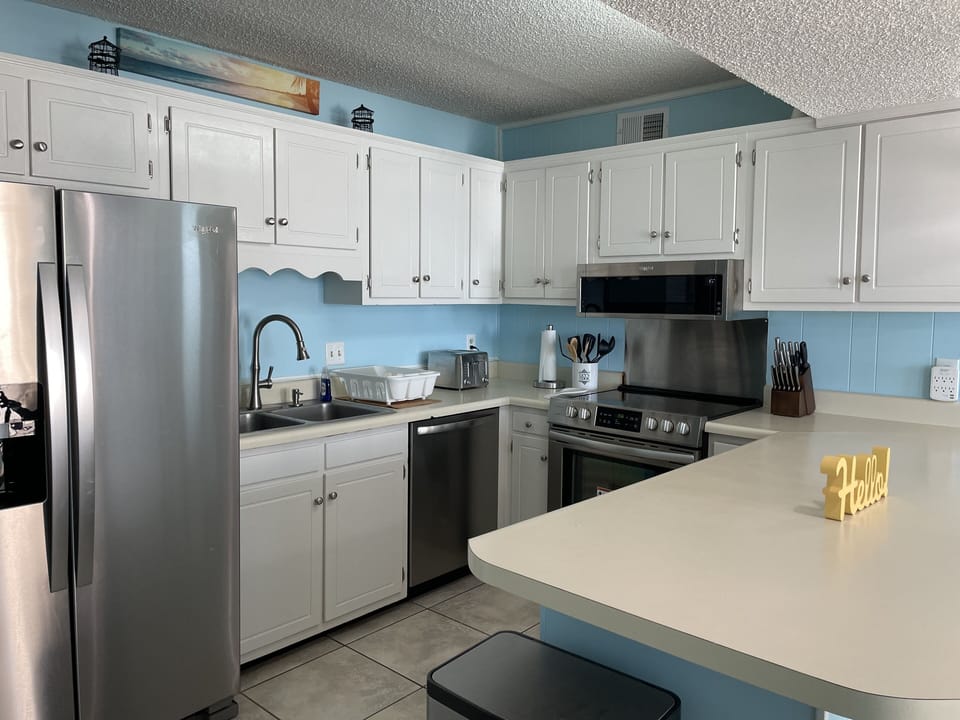 Fully stocked Kitchen with Stainless Steel Appliances