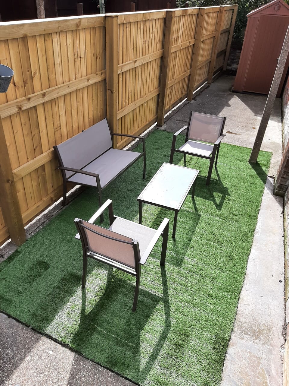 Sunny garden with fence / gate