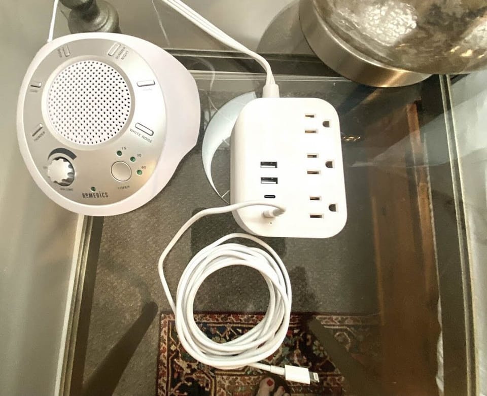 Each bedside table has handy plug in / phone charging stations. 