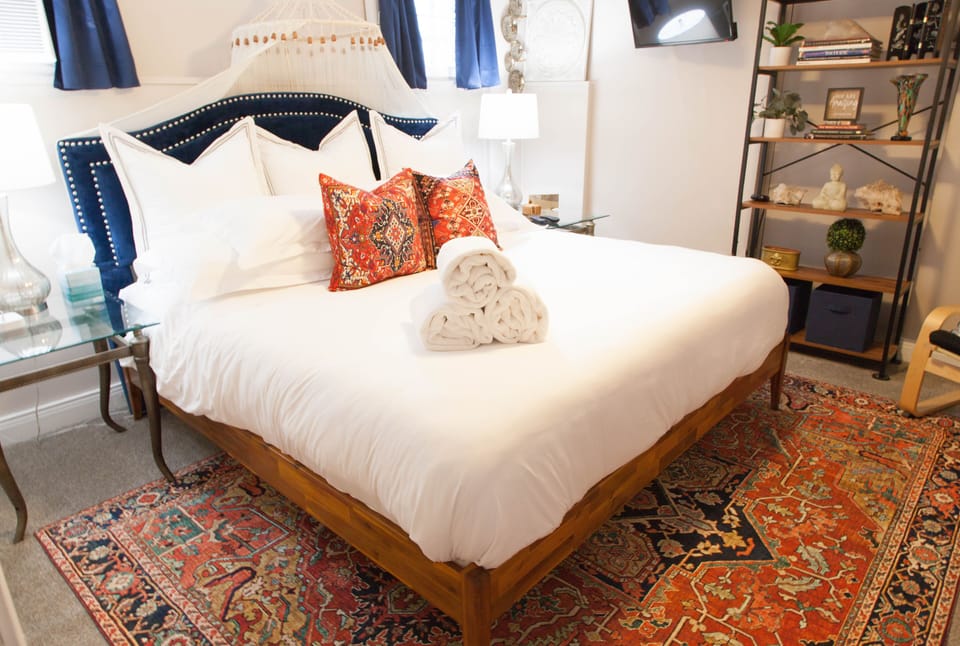 Brand new ultra plush King size bed. Pristine white cotton sheets and comforter!