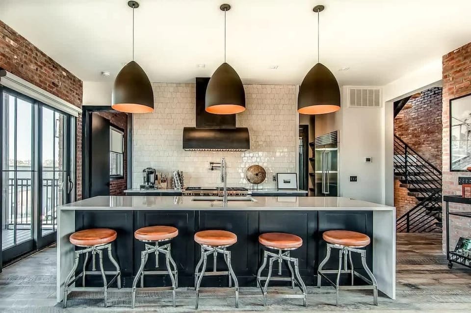 Home 1 - Large light filled kitchen with tons of island space and professional appliances.
48" Wolf Range and Double OvenSub Zero Refrigerator and Wine Fridge