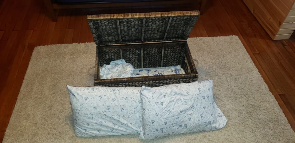 sheets, quilts & 2 pillows for futons in chest