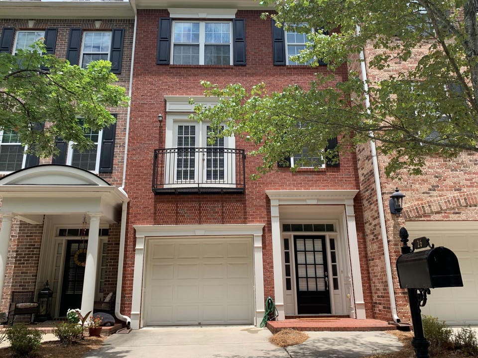 Front View of Townhouse. Off street parking for 2 automobiles.