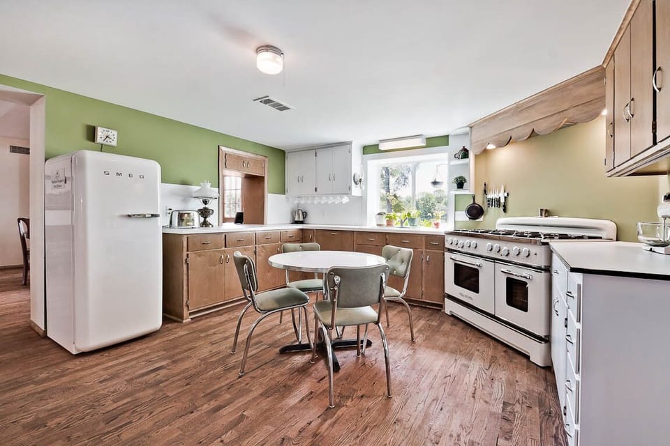 Kitchen - Smeg fridge, 8 burner gas stove