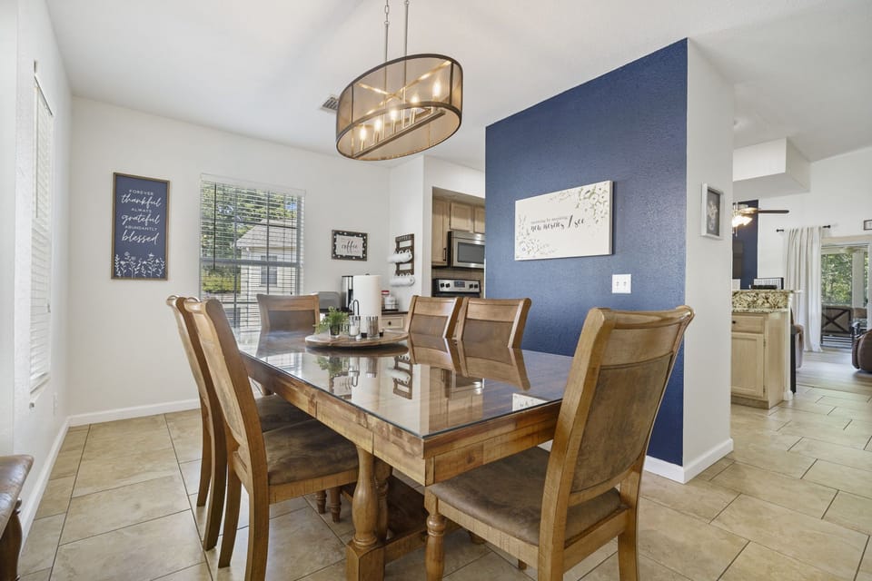 Dining Room seats 8 adults comfortably. 6 chairs plus a bench. 4 stools at bar.