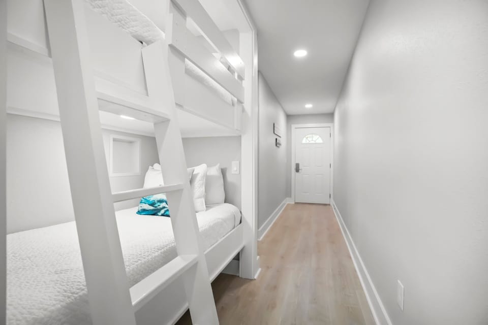 Back view from hall of bunk beds