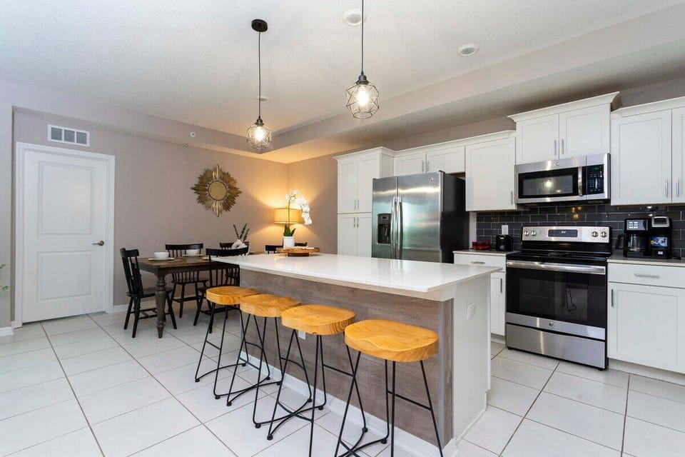 Fall in love for modern luxury with our stunning open kitchen—a beautiful, vibrant space that seamlessly combines style and functionality. a family-friendly retreat where the joy of cooking meets the warmth of togetherness.