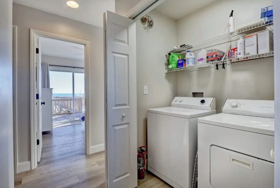 2 laundry areas: stackable washer/dryer on 3rd floor as well as side by side 